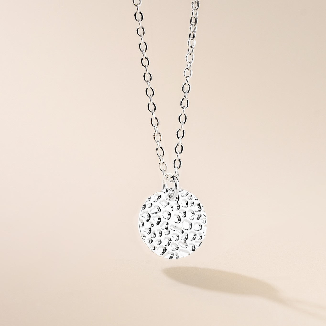 Hammered disc pendant Silver